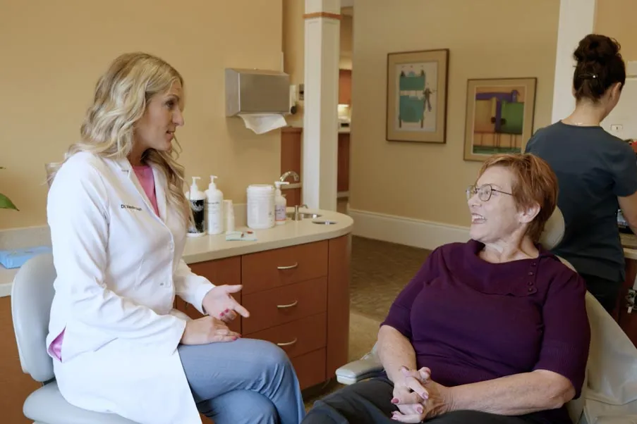 A Grandville Dental clinician discussing cosmetic treatment options with a patient